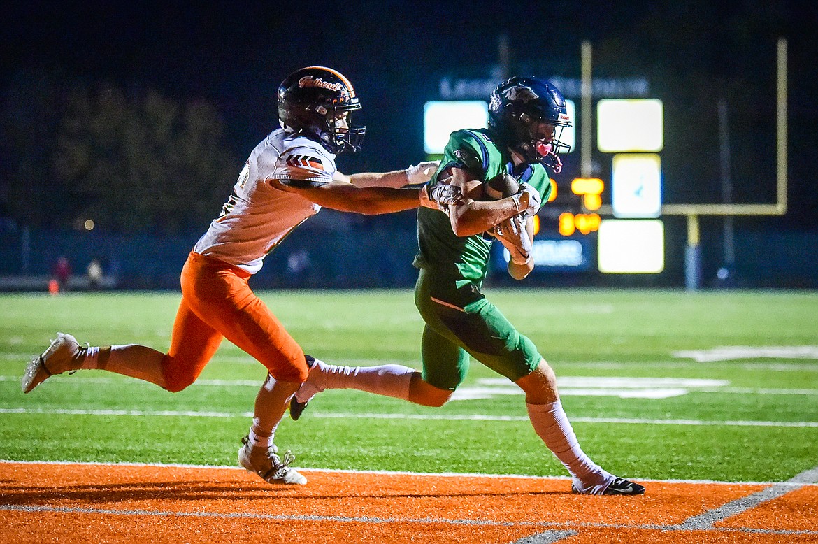 Glacier wide receiver Alex Hausmann (3) catches a 3-yard touchdown reception in the fourth quarter against Flathead at Legends Stadium on Thursday, Oct. 5. (Casey Kreider/Daily Inter Lake)