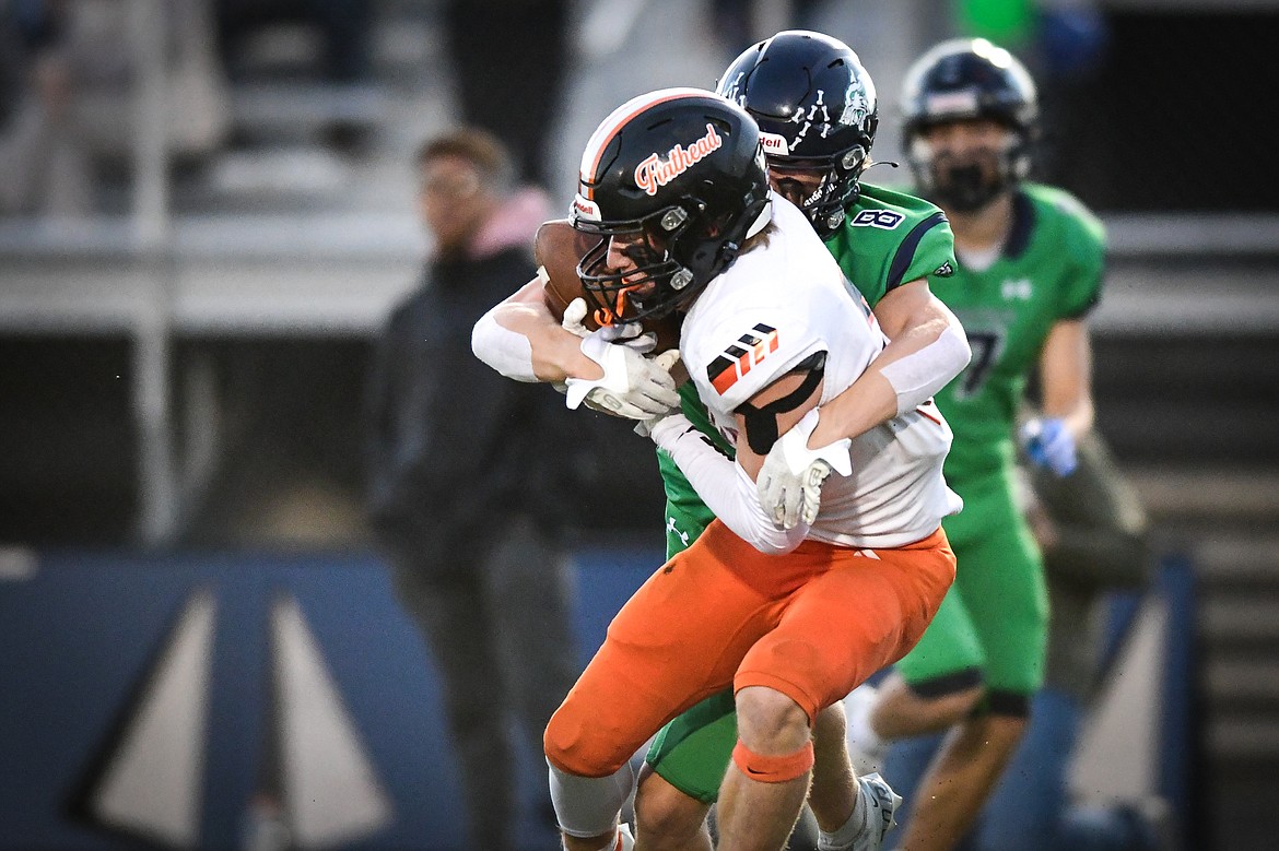 Flathead wide receiver Stephen Riley (7) pulls in a long reception in the first quarter against Glacier at Legends Stadium on Thursday, Oct. 5. (Casey Kreider/Daily Inter Lake)