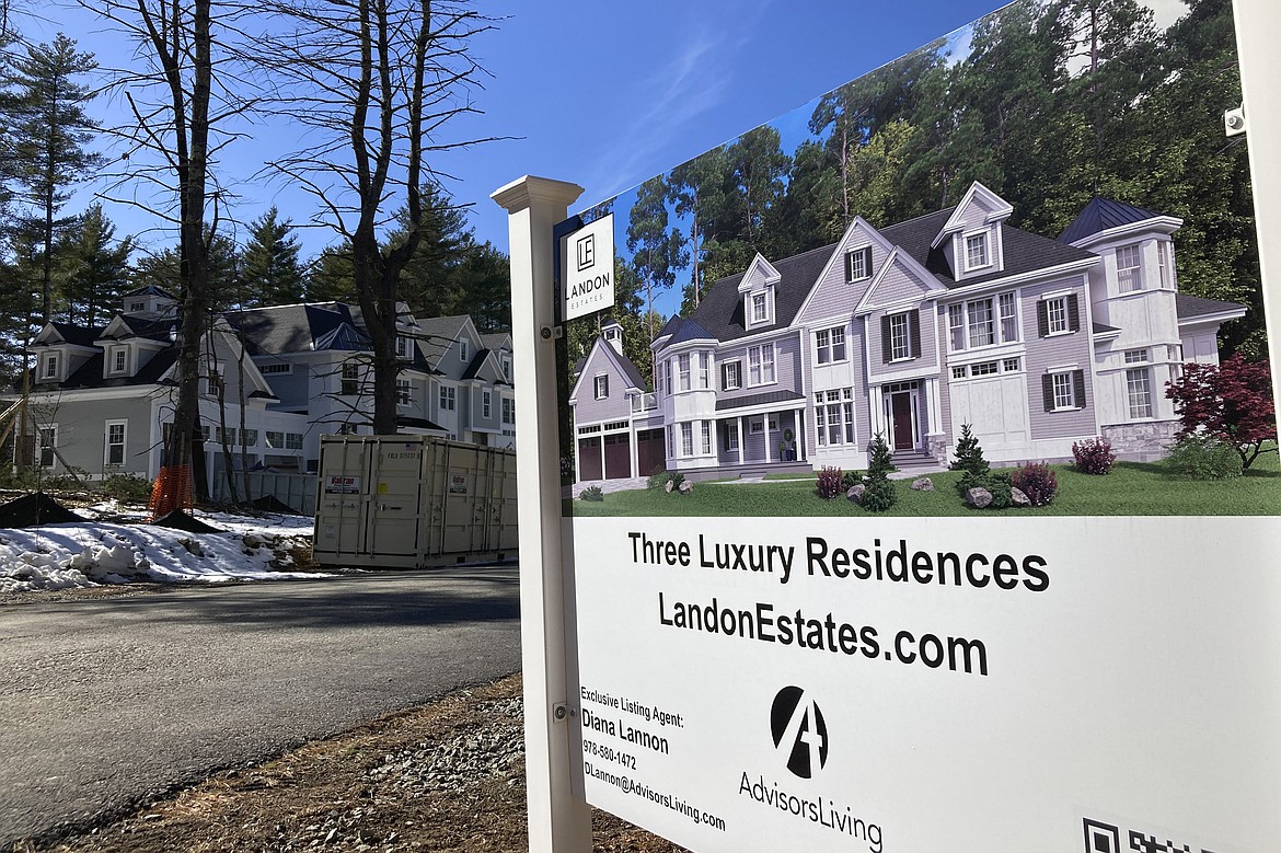 A sign announces newly built homes in Sudbury, Ma., on March 12, 2023. On Thursday, Freddie Mac reports on this week's average U.S. mortgage rates. (AP Photo/Peter Morgan, File)