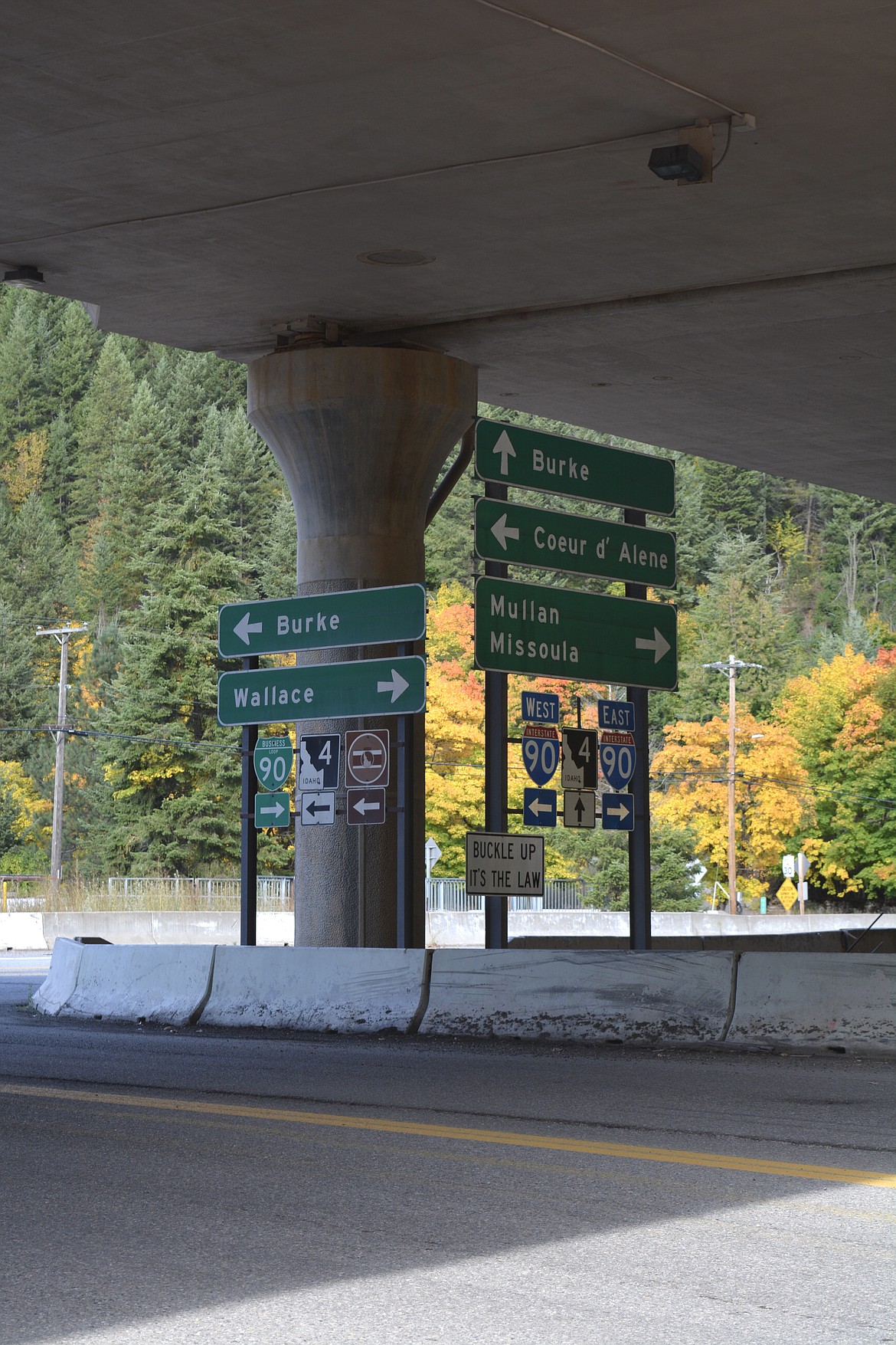 Directional signs for Burke, Wallace, Coeur d'Alene and Missoula, Mont. and Mullan guide travelers using I-90.