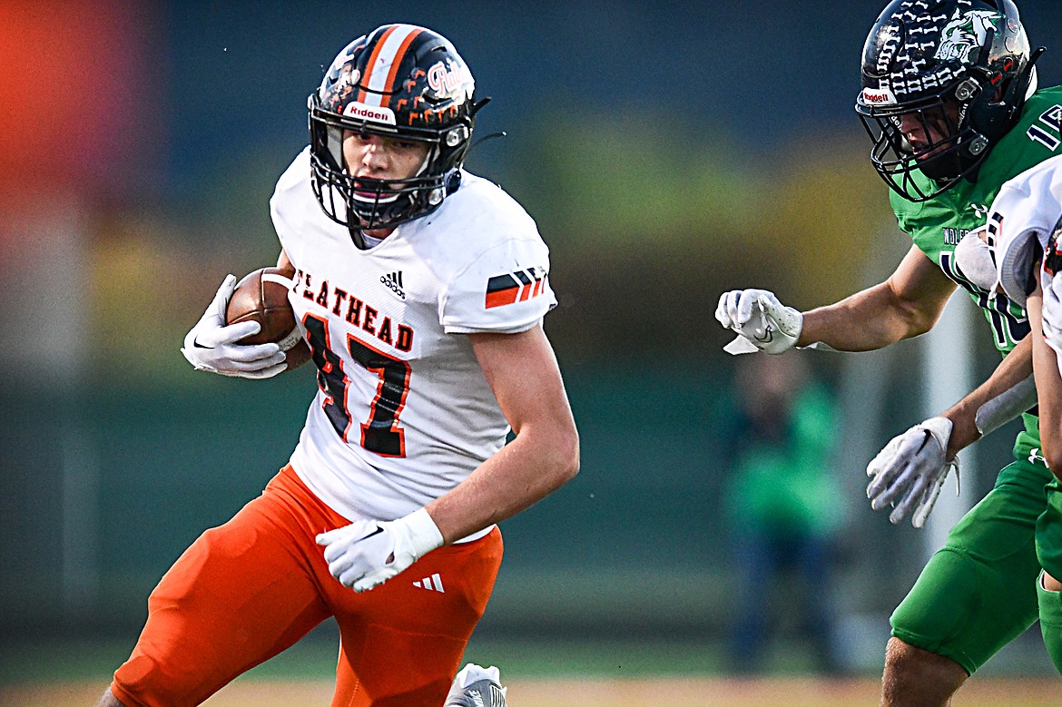 Flathead tight end Braden Capser (47) picks up yardage on a run in the first quarter against Glacier at Legends Stadium on Thursday, Oct. 5. (Casey Kreider/Daily Inter Lake)