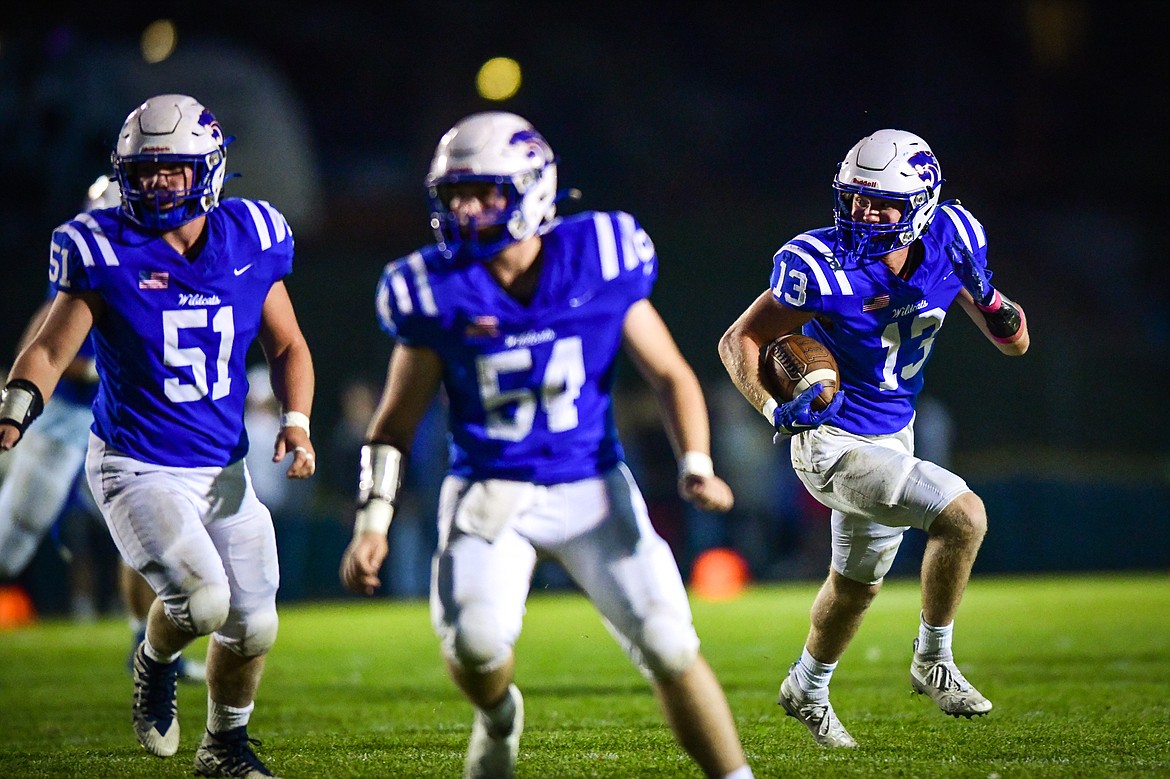 Columbia Falls running back Alihn Anderson (13) scores a touchdown on a reception in the second quarter against Libby at Satterthwaite Field on Friday, Oct. 6. (Casey Kreider/Daily Inter Lake)