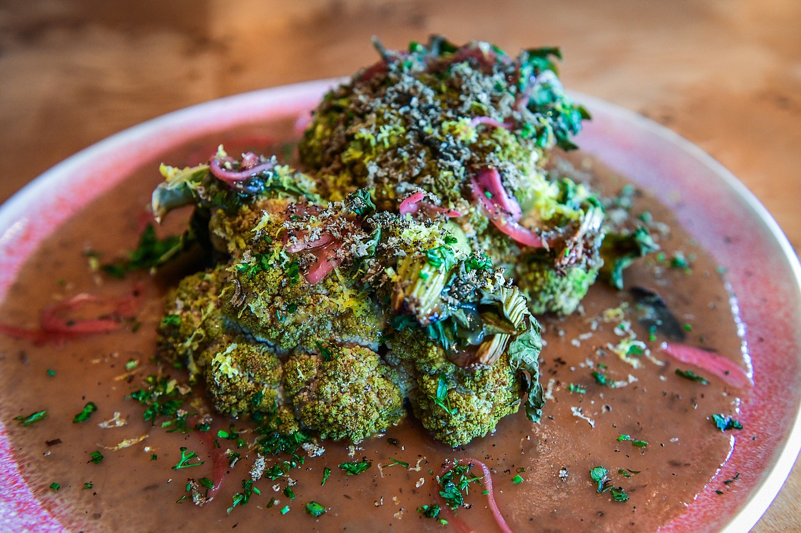 Charred cauliflower head with truffle vegetable demi sauce, pickled onion and fried capers at Herb & Omni in Whitefish on Wednesday, Oct. 4. (Casey Kreider/Daily Inter Lake)