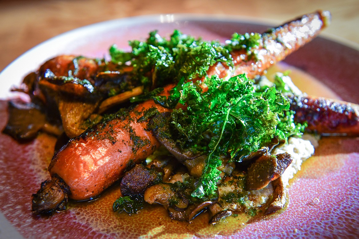 Vadouvan carrots with pan-roasted mushrooms, celery root cashew cream and pistou at Herb & Omni in Whitefish on Wednesday, Oct. 4. (Casey Kreider/Daily Inter Lake)