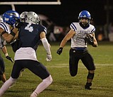 Coeur d'Alene runs past Lake City in 5A IEL opener