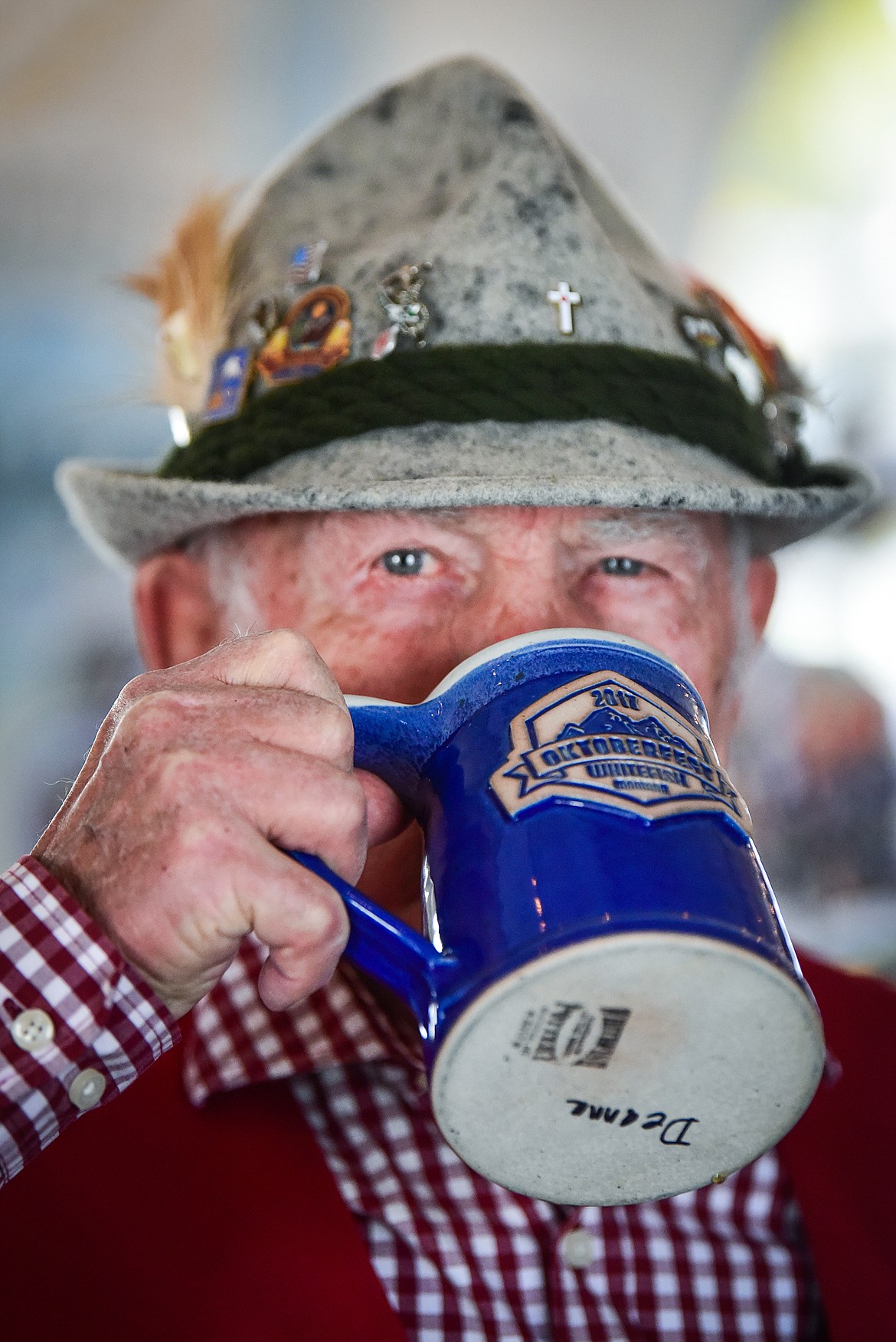 Otto Ratz takes a sip of beer from his stein at The Great Northwest Oktoberfest in Whitefish on Saturday, Oct. 7. (Casey Kreider/Daily Inter Lake)