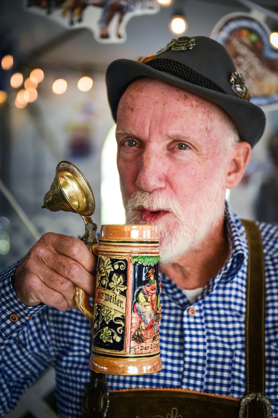 Marty Weimer takes a sip of beer from his stein at The Great Northwest Oktoberfest in Whitefish on Saturday, Oct. 7. (Casey Kreider/Daily Inter Lake)