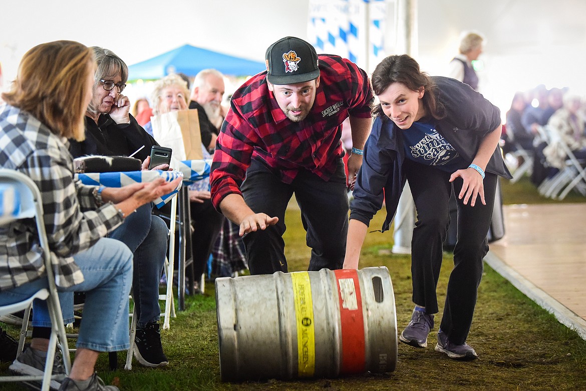 Kyle Thurk and Carolyn Harms won the barrel-rolling competition at The Great Northwest Oktoberfest in Whitefish on Saturday, Oct. 7. (Casey Kreider/Daily Inter Lake)