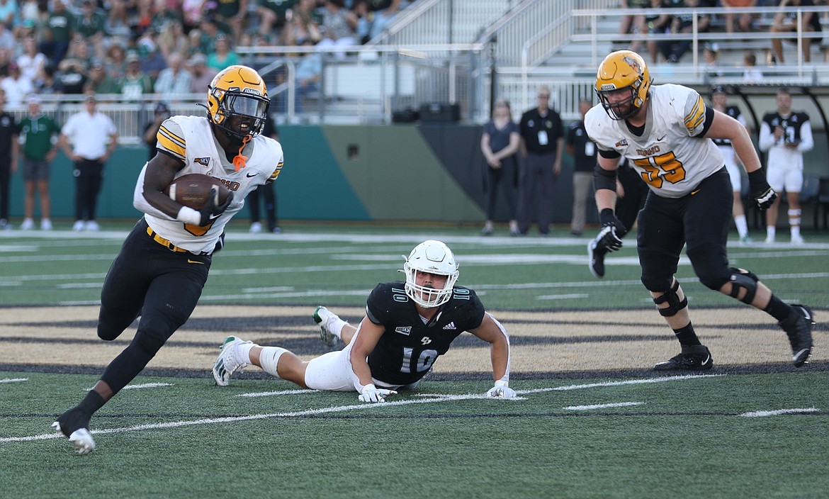 Photo by IDAHO ATHLETICS
Idaho's Anthony Woods runs upfield vs. Cal Poly on Saturday in San Luis Obispo, Calif.