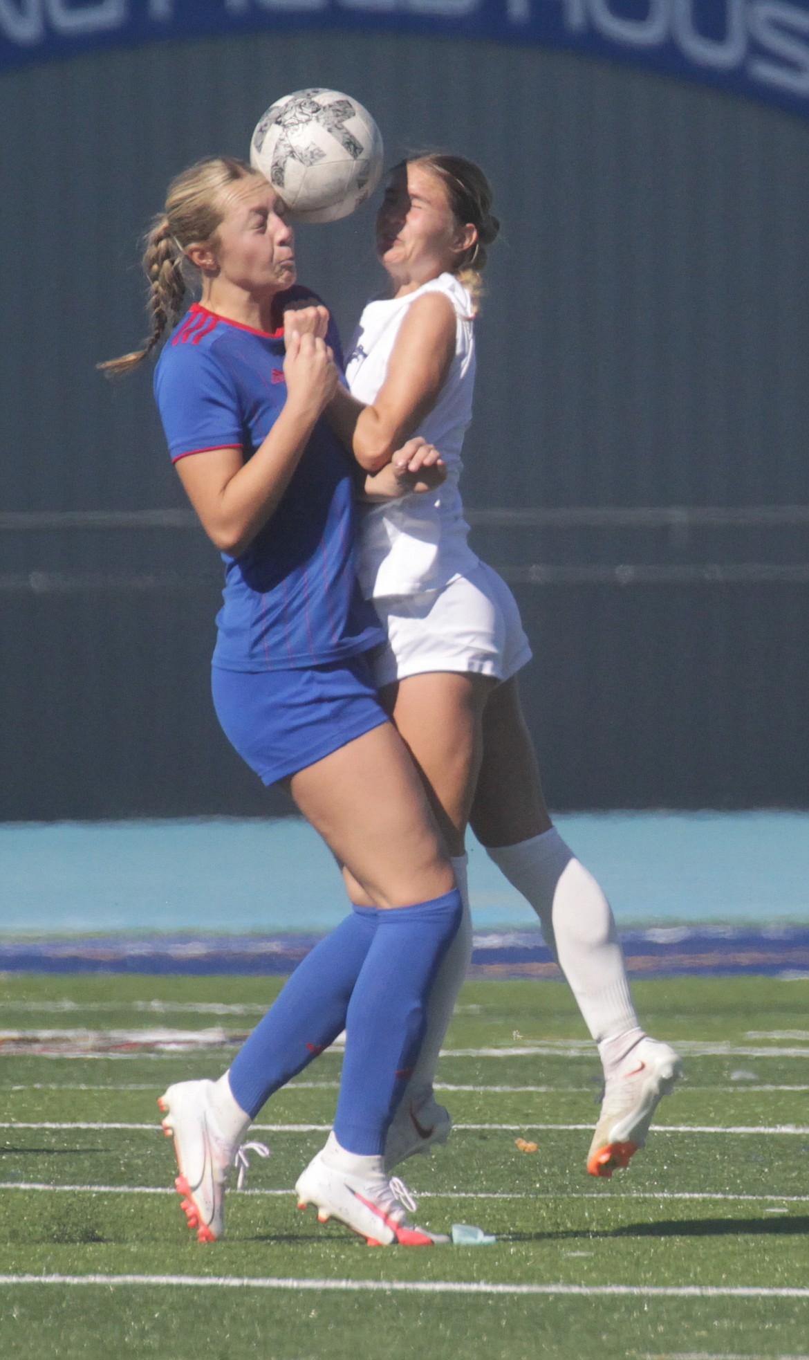 MARK NELKE/Press
Gianna Callari, left, of Coeur d'Alene and Taylor Miller of Lake City vie for a header during Saturday's 5A Region 1 girls soccer semifinal at Coeur d'Alene High.