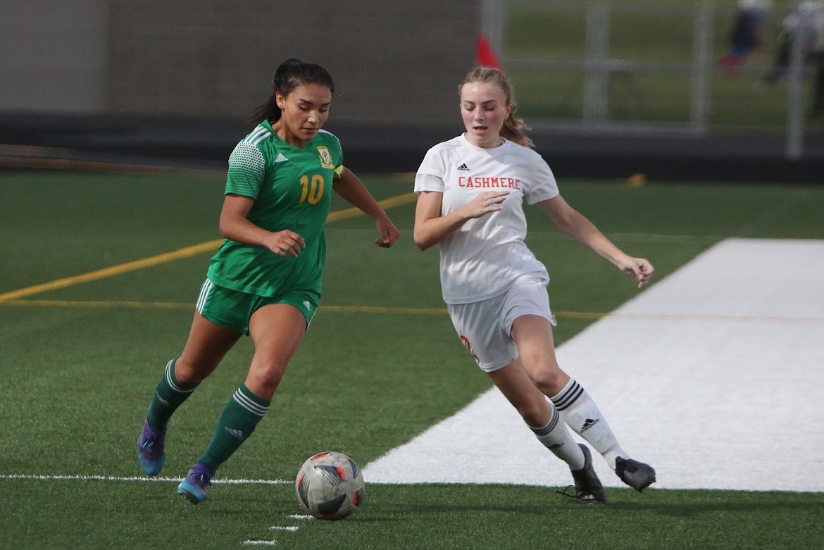 Quincy senior Michelle Acevedo (10) keeps her eye on the ball in the first half against Cashmere.