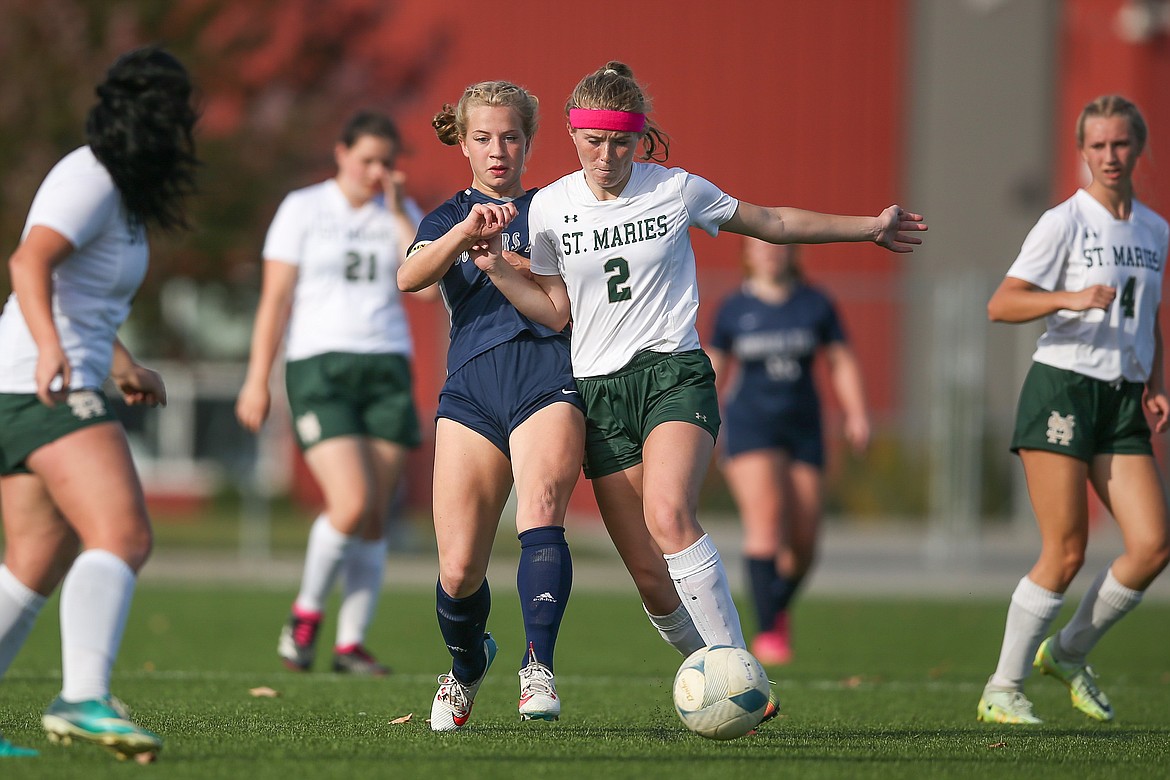 JASON DUCHOW PHOTOGRAPHY
St. Maries sophomore Madison Hillman (2) battles a Bonners Ferry player for the ball in a first-round game of the 3A District 1-2 girls soccer tournament at The Fields at Real Life in Post Falls.