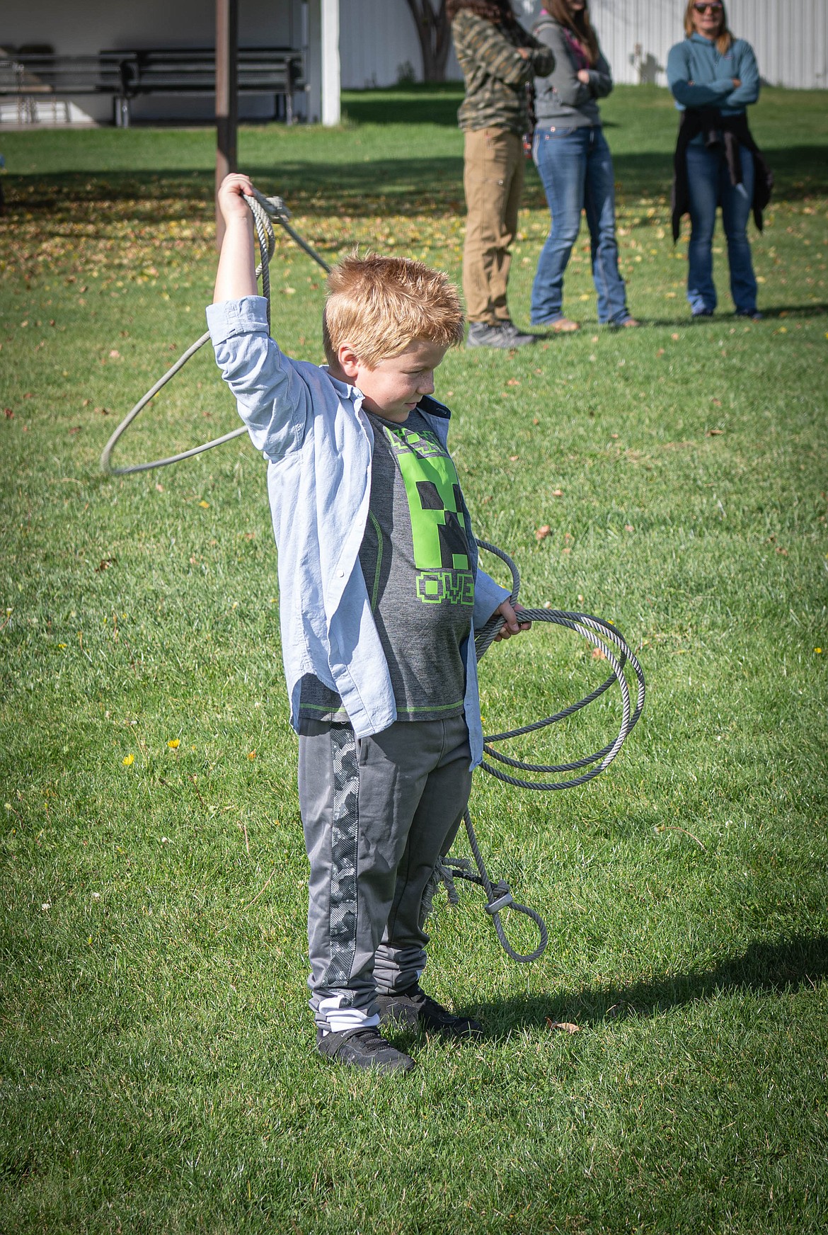 Aiden Williams learns about calf roping at Ag Days. (Tracy Scott/Valley Press)