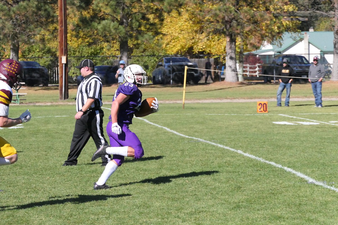 Tigers senior running back John Pruitt breaks free on his way to a long TD runs during St. Regis-Mullan's game vs Shelby Saturday afternoon in St. Regis. (Chuck Bandel/MI-VP)