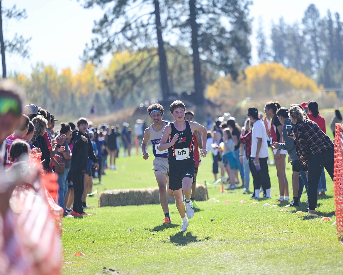 Ronan's William Normandeau and Polson's Kai McDonald head for the finish line during Saturday's Mission Shadow meet in Pablo. (Christa Umphrey photo)