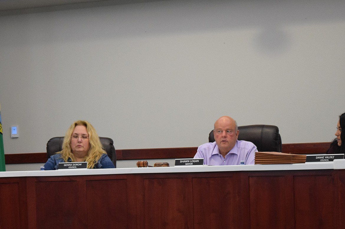 Othello Mayor Shawn Logan, left, addresses citizen input on the potential of funding Adams County Pet Rescue during Monday’s regular city council meeting.