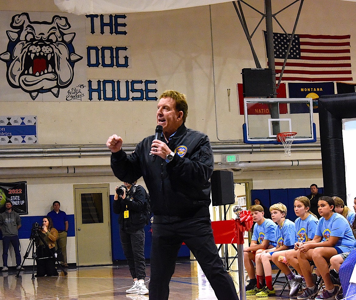Jake Steinfeld pumps up the St. Ignatius schools student body, telling them, "Don't Quit" and "Achieve your dreams" during a presentation of the $100,000 new fitness center. (Berl Tiskus/Leader)