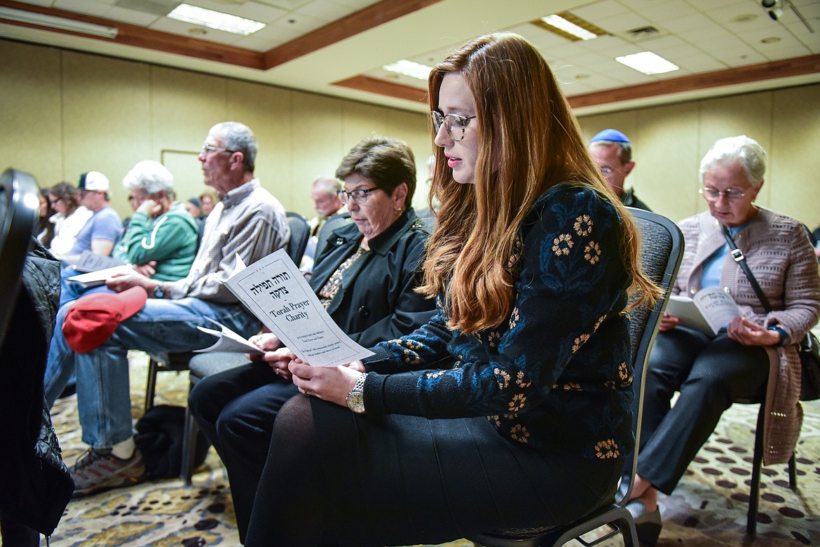 Attendees sing hymns and read prayers at a United for Israel gathering at the Red Lion Hotel in Kalispell on Tuesday, Oct. 10. (Casey Kreider/Daily Inter Lake)