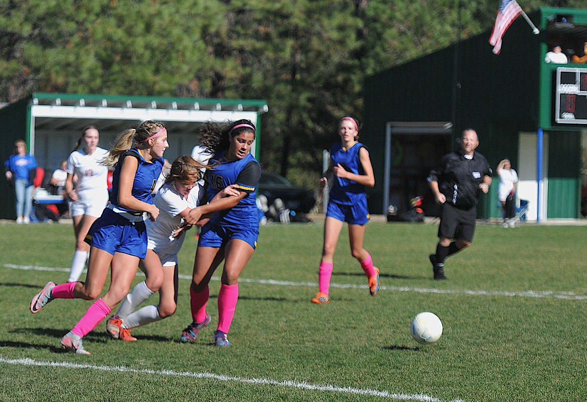 Libby's Maggie Fantozzi and Marissa Hollingsworth compete against Bigfork on Saturday, Oct. 7. (Hannah Chumley/The Western News)