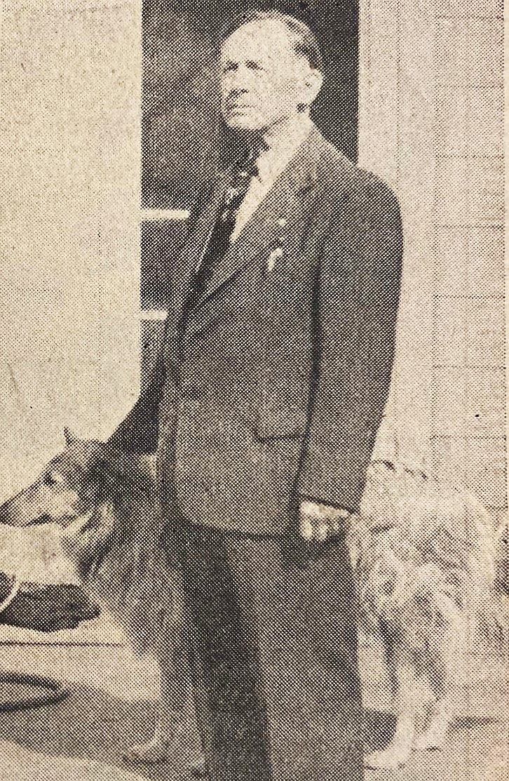 After retirement in 1949, prominent lumberman A.P. Bailey is shown with his collie, Lass.