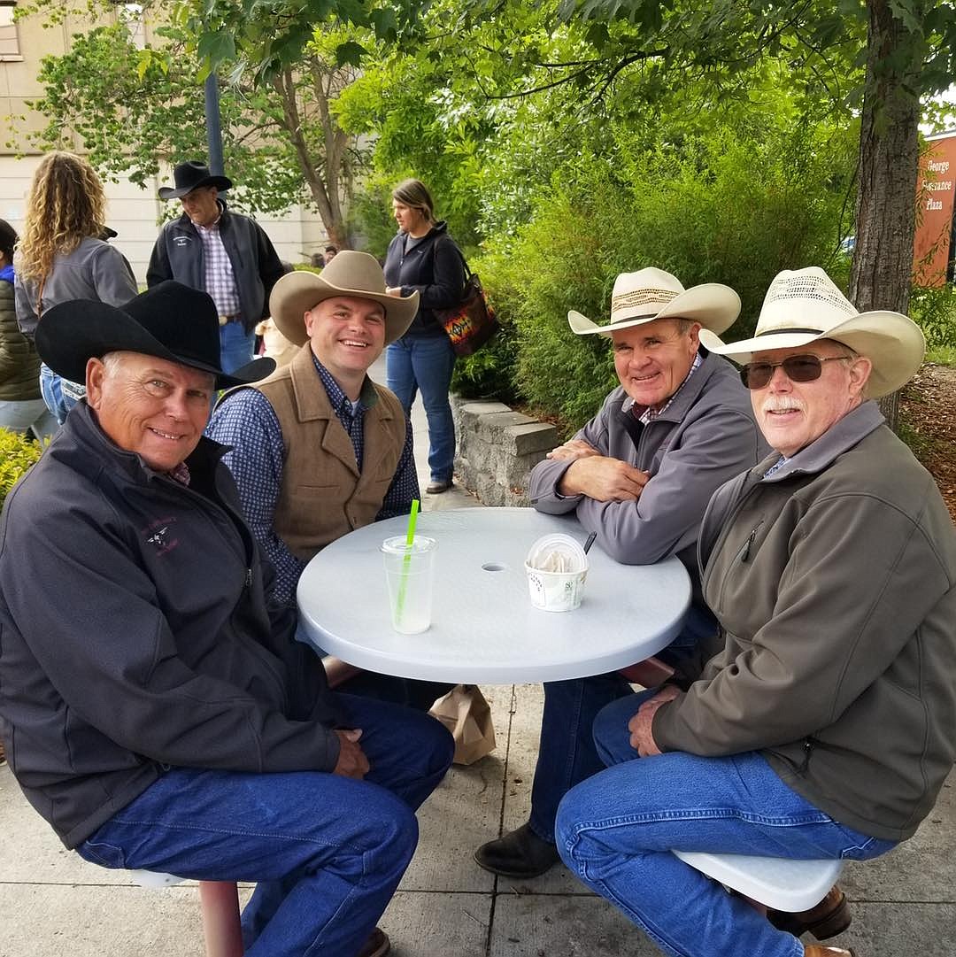 Past Washington Cattlemen’s Association President Don Blakemore, incoming President Branden Brink-Lynden, current President Jeff Keane and Ephrata rancher and past President Bill Sieverkroppon sit at the Washington State University campus after a June 20th agriculture tour.