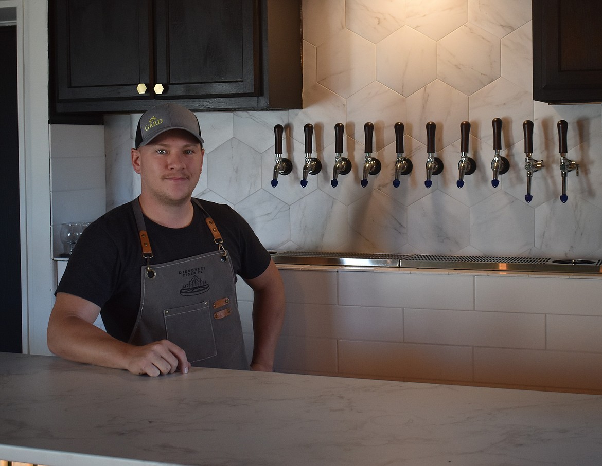 Discovery Cider Company co-owner Brennan James stands behind the bar at the not-quite-yet opened watering hole. James became a cidermaker as a hobby that eventually turned into a business he now runs with his wife, Berlyn Sandstrom.