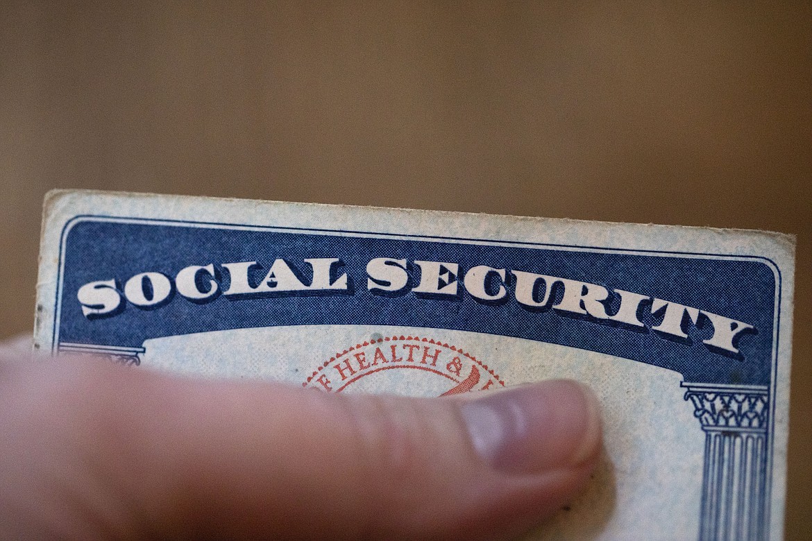 A Social Security card is displayed on Oct. 12, 2021, in Tigard, Ore. About 71 million people including retirees, disabled people and children receive Social Security benefits. (AP Photo/Jenny Kane, File)