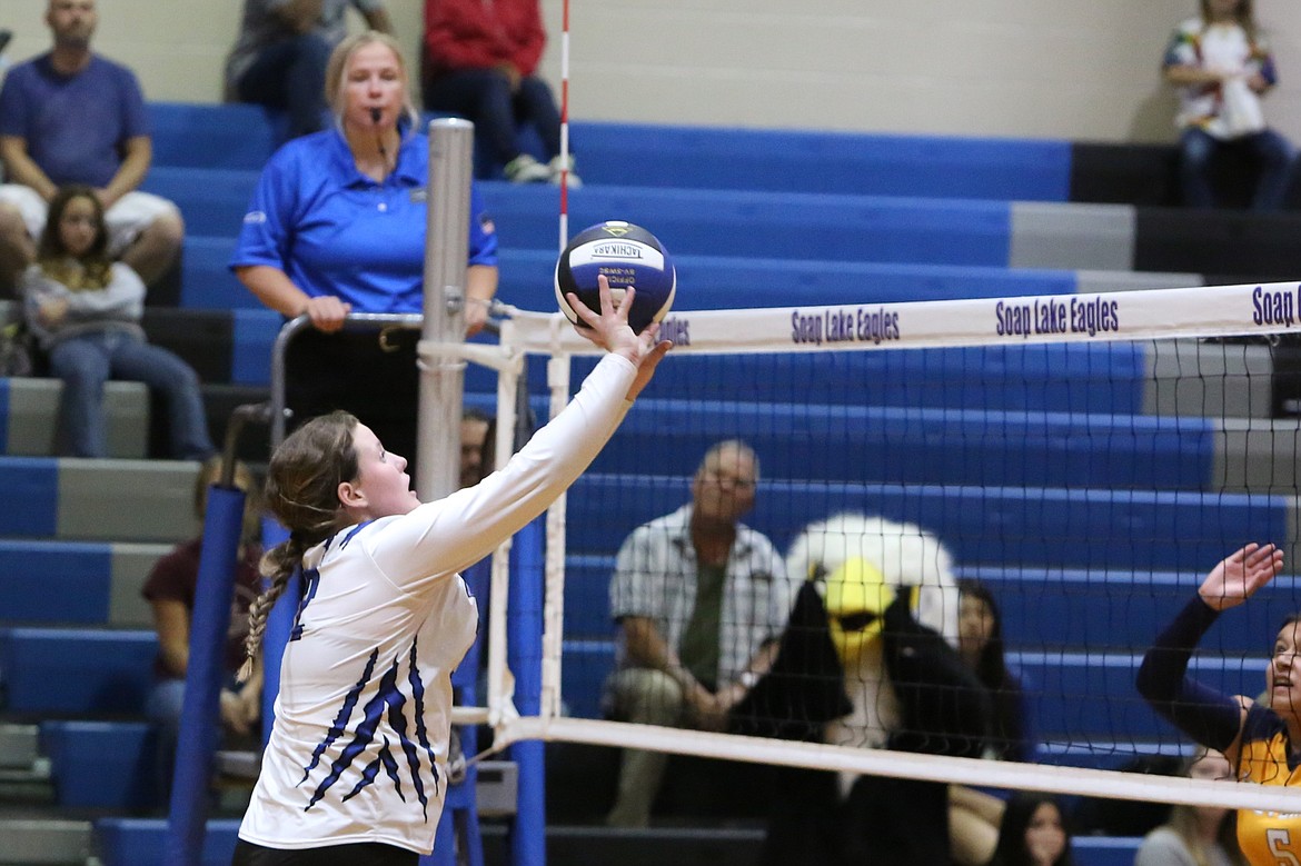 Soap Lake sophomore Brooke Dana sets the ball in a Sept. 19 game against Cascade Christian.