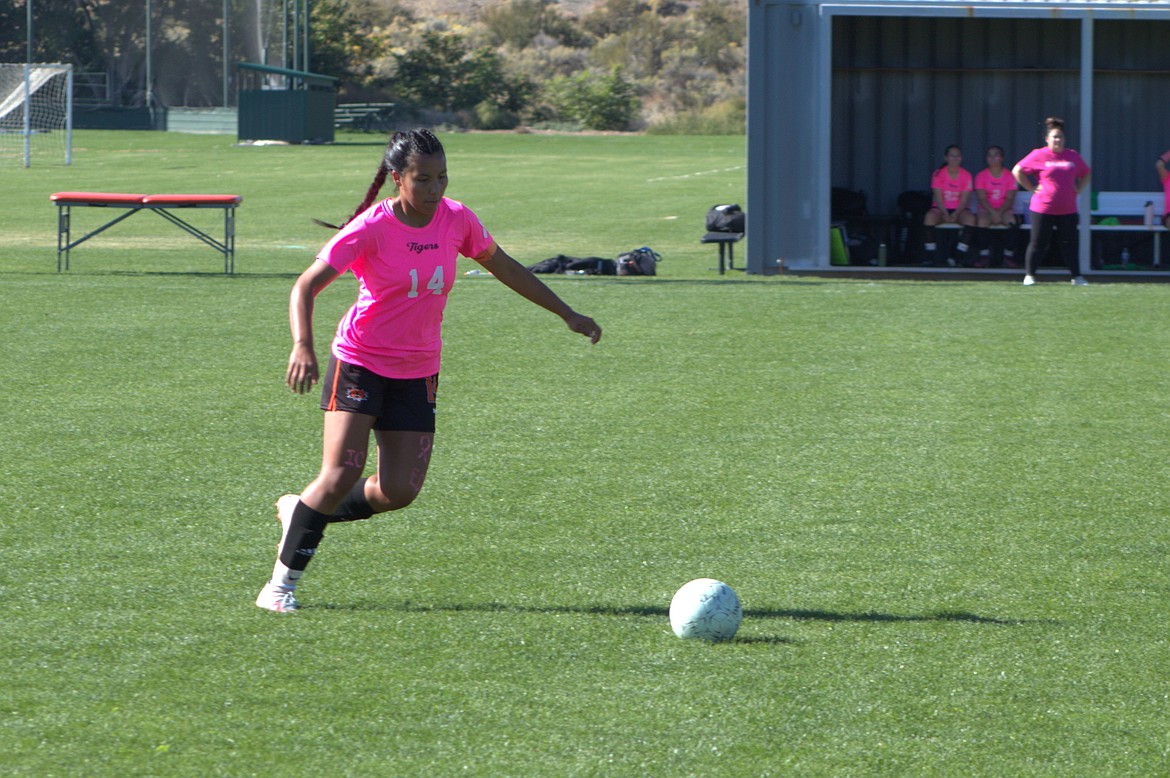 Ephrata senior Alessa Soto rushes toward the ball in Saturday’s game against Othello.