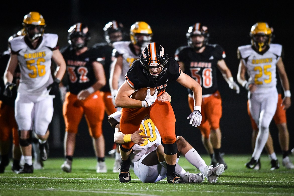 Flathead tight end Gabe Sims (84) picks up yardage after a reception in the fourth quarter against Helena Capital at Legends Stadium on Friday, Oct. 13. (Casey Kreider/Daily Inter Lake)