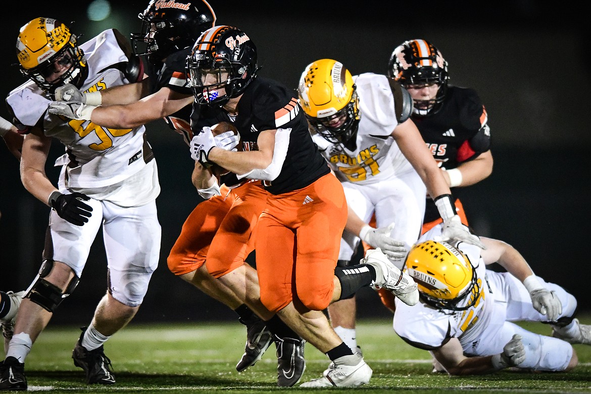 Flathead running back Jaden Williams (1) picks up yardage on a run in the fourth quarter against Helena Capital at Legends Stadium on Friday, Oct. 13. (Casey Kreider/Daily Inter Lake)