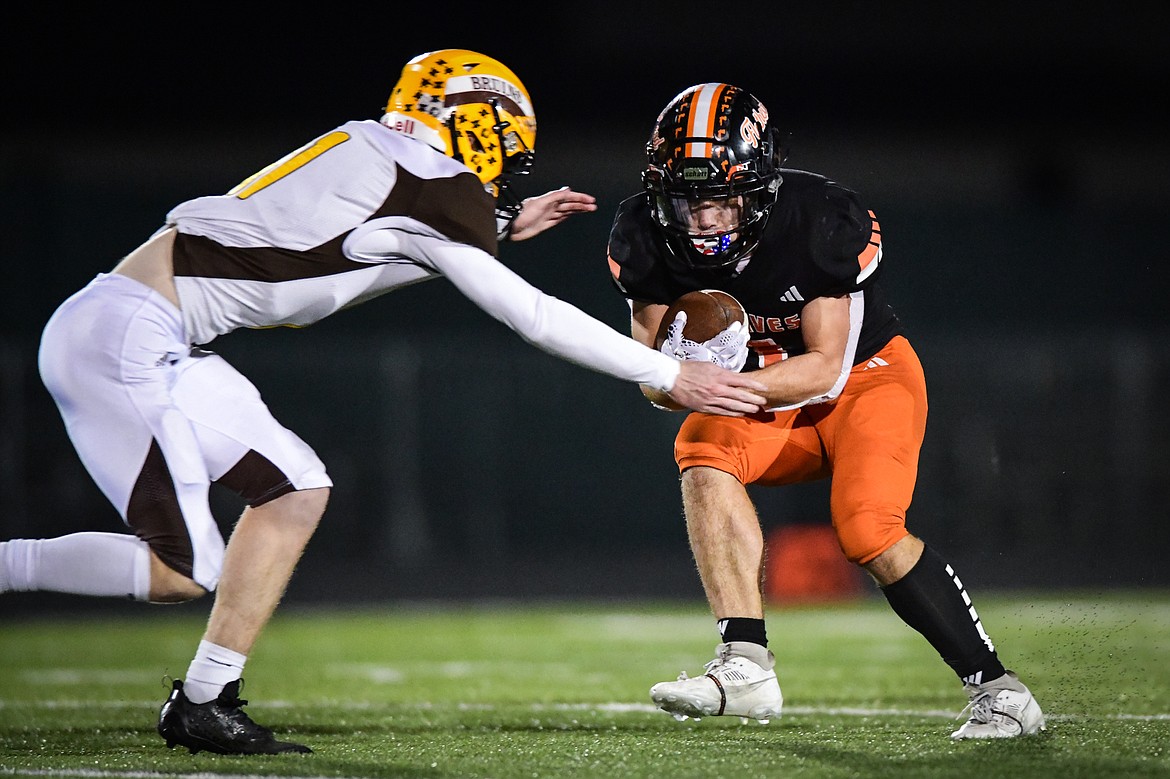 Flathead running back Jaden Williams (1) picks up yardage on a run in the fourth quarter against Helena Capital at Legends Stadium on Friday, Oct. 13. (Casey Kreider/Daily Inter Lake)