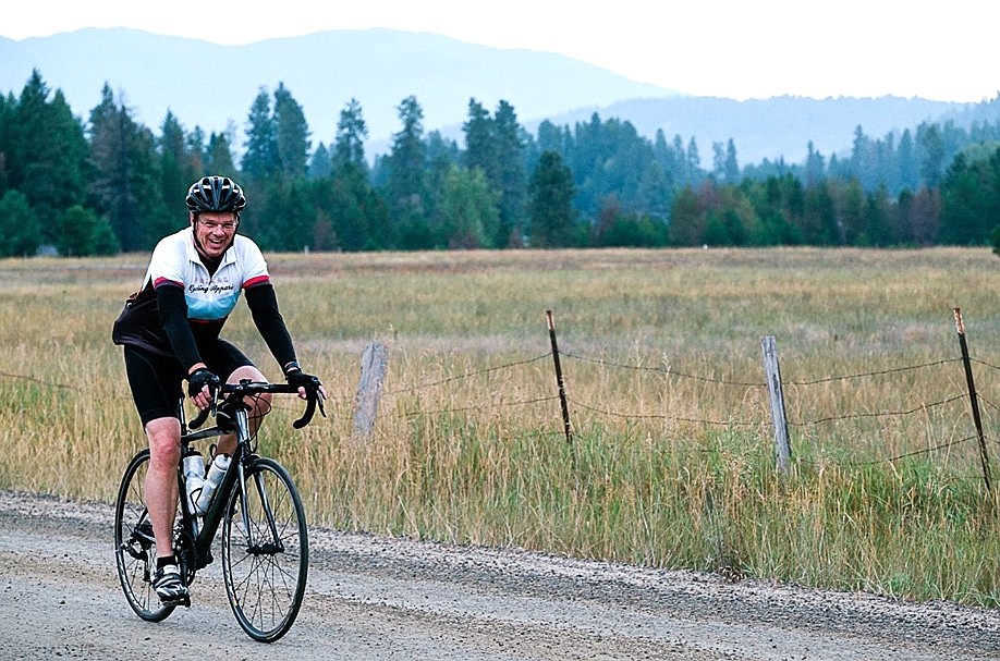 Bill Reagan smiles during a bike ride.