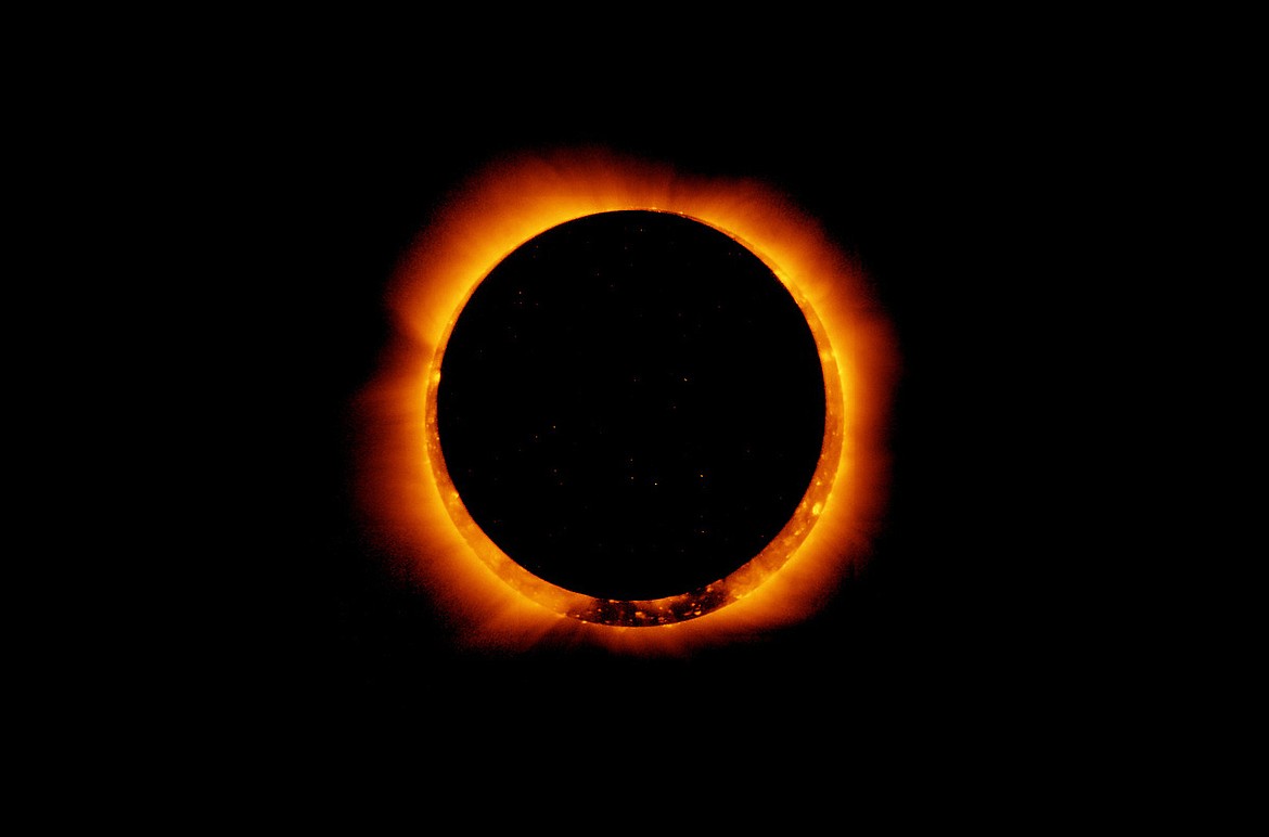 Photo of an annular solar eclipse taken by the solar optical telescope Hinode as the moon came between it and the sun.