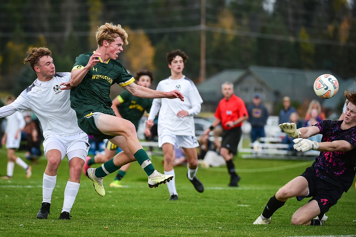 Whitefish's Jackson Dorvall (10) has his shot deflected wide of the goal by Livingston keeper Isaac Winfrey (41) in the first half at Smith Fields on Saturday, Oct. 14. (Casey Kreider/Daily Inter Lake)