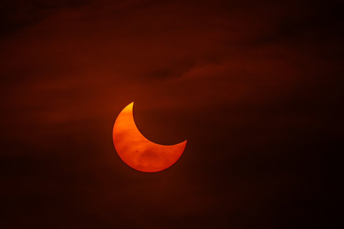 Moses Lake resident Matthew Paluch submitted this photo of the Annular Solar Eclipse which affected the Columbia Basin Saturday morning. He indicated that the photo was taken from Cascade Park in Moses Lake. Paluch is a runner and father whose son, Damien Paluch, was recently commended by the National Merit Scholar program. To submit your photo for possible publication, email it to us at editor@columbiabasinherald.com.