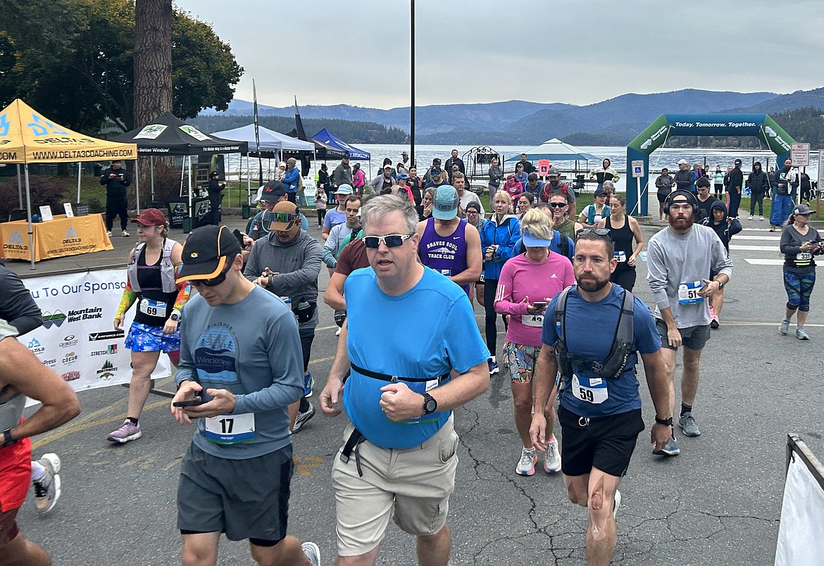 Runners head out at the start of the Hayden Lake Marathon on Saturday.