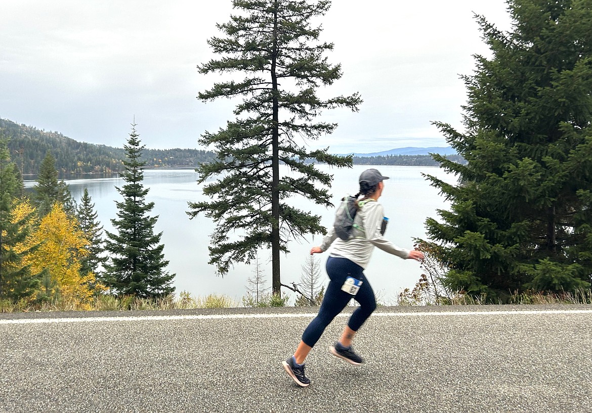 Karlie Slayer passes a scenic viewpoint of the Hayden Lake Marathon on Saturday.