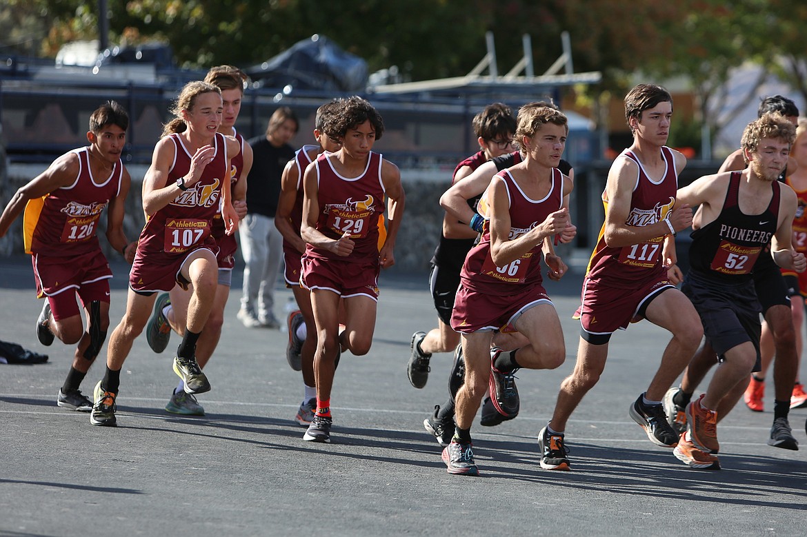 The Moses Lake Mavericks get off the line at the start of Thursday’s race at the Moses Lake Cross Country Invitational at The Gorge Amphitheater.