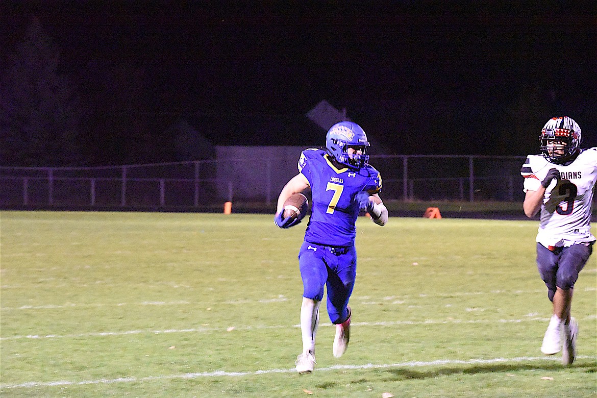 Libby's Ian Thom finds room to run against Browning on Friday, Oct. 13. (Scott Shindledecker/The Western News)