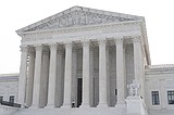 A Supreme Court dispute over a $15,000 IRS bill may be aimed at a never-enacted tax on billionaires