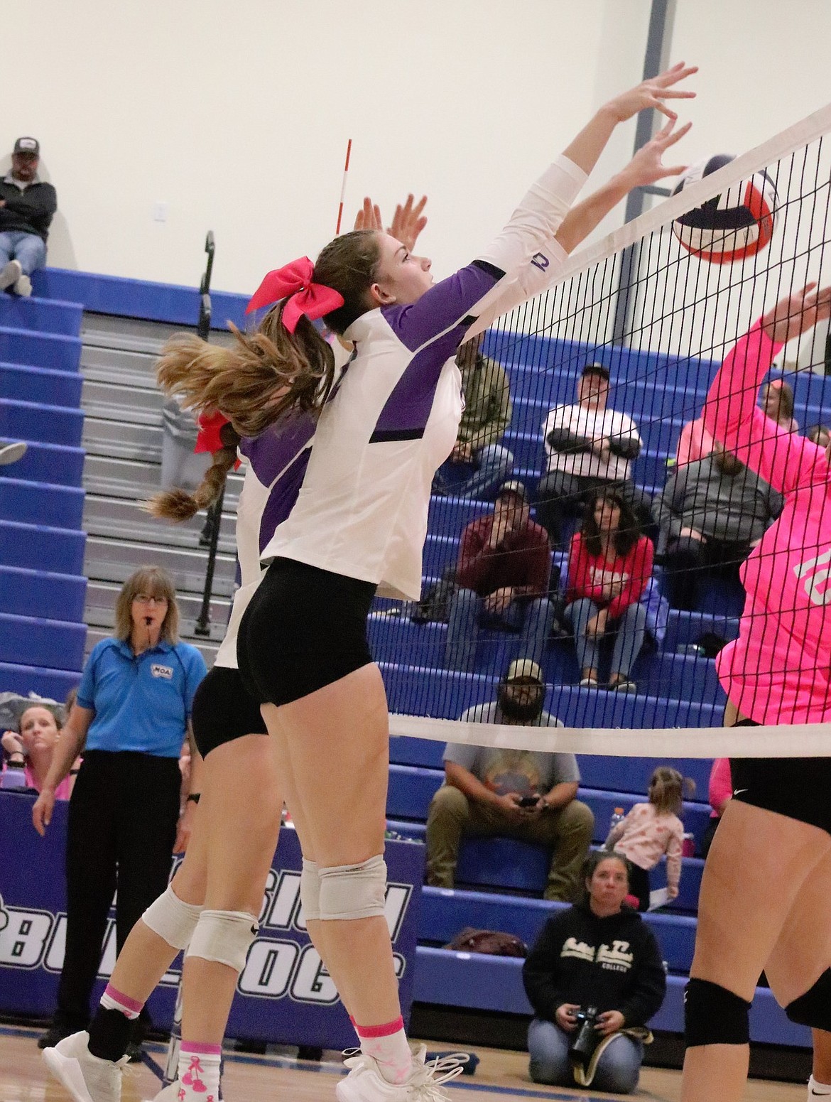 Charlo's Aida Cote tips the ball across the net during last Tuesday's game against Mission. (Michelle Sharbono photo)