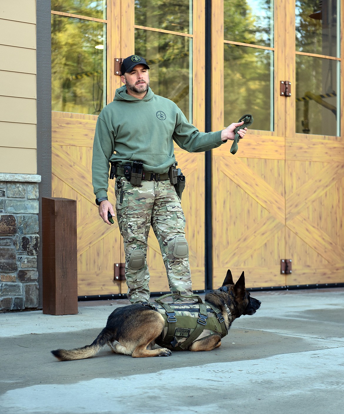 SWAT K9 handler Deputy Pat McGauley and Audie prepare for the bite demonstration. (Julie Engler/Whitefish Pilot)