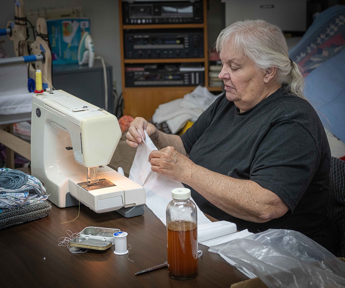 Judy Hawley with Stitch In Times works on a quilt. (Tracy Scott/Valley Press)