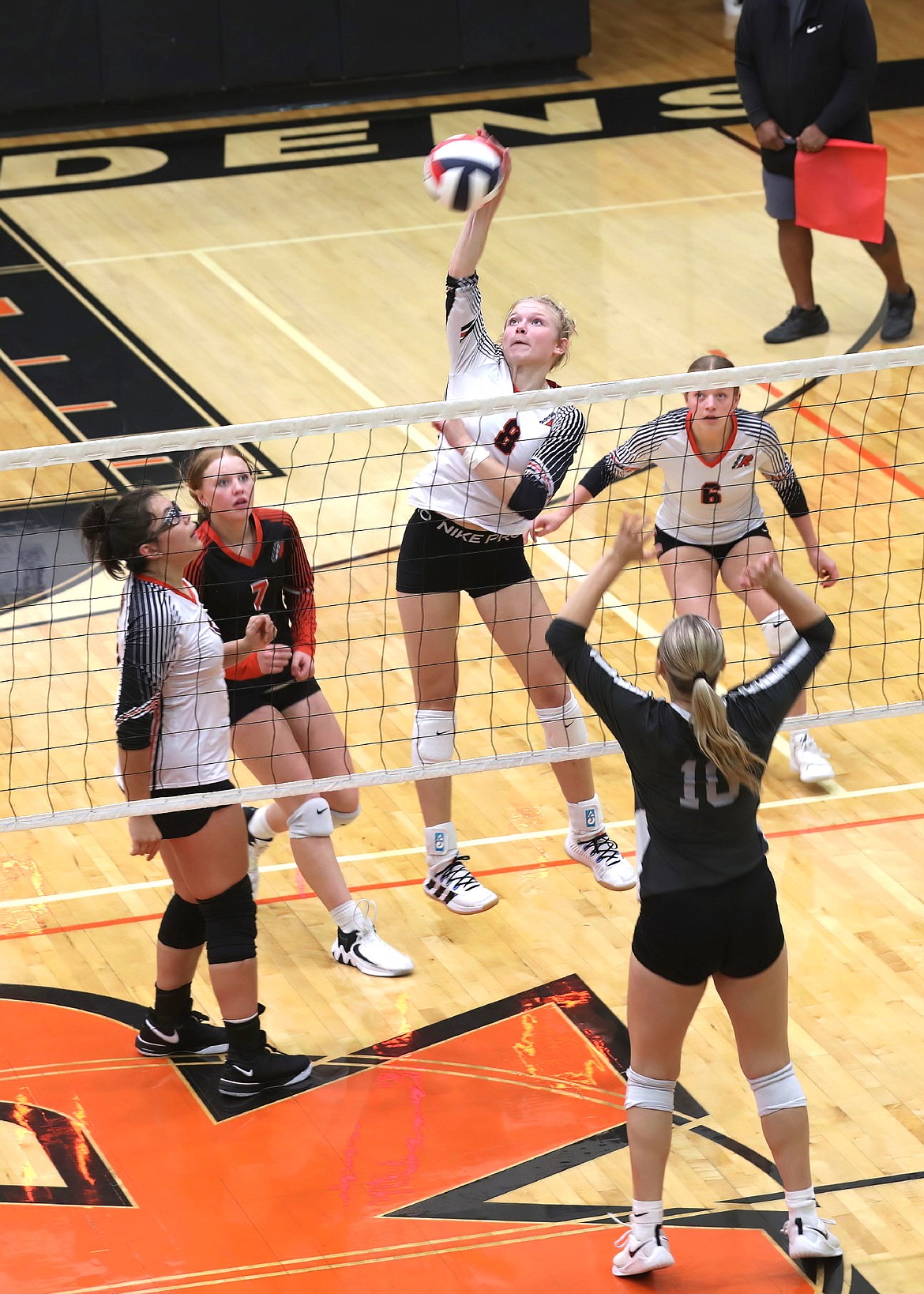 Ronan's Lauryn Buhr sends one back over the net in last Tuesday night's game with Polson. (Susan Lake photo)