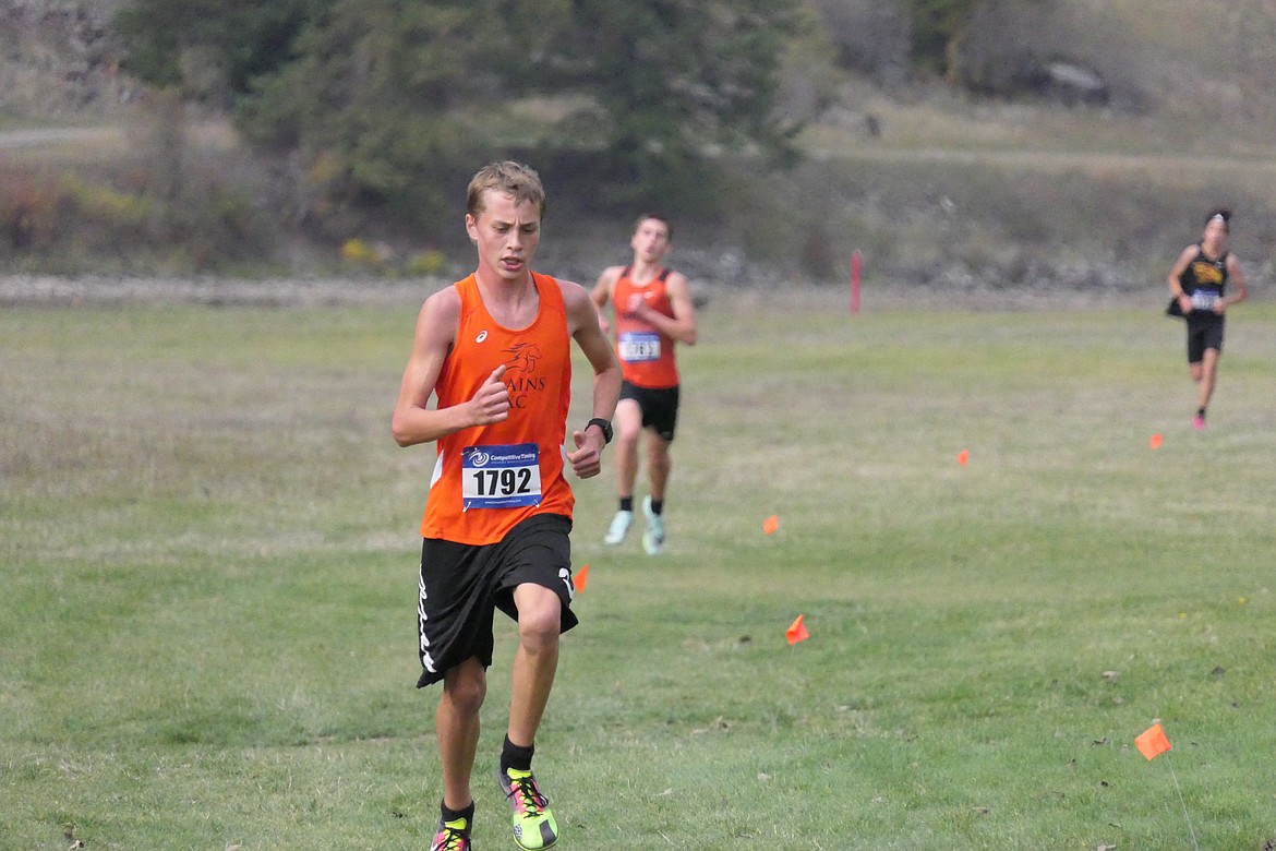 Plains eighth-grader John Owen Jermyn heads to the finish line of the Western Divisional B-C cross country championships last Thursday in T Falls.  Jermyn placed 8th.  (Chuck Bandel/VP-MI)