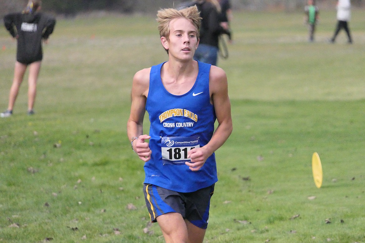 Thompson Falls cross country runner Cael Thilmony on his way to an eleventh place finish at the Western Divsiional B-C cross country finals last Thursday at Rivers Bend Golf Course outside of T Falls.  (Chuck Bandel/VP-MI)