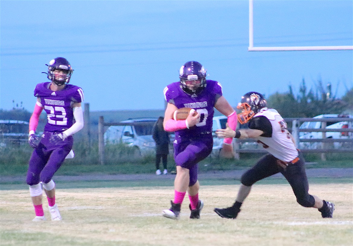 Charlo Viking Ryan Sharbono evades the tackle during last week's game against Plains. (Michelle Sharbono photo)