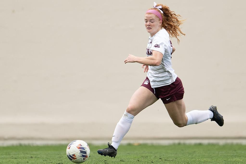 Montana's Skyleigh Thompson works the ball up the field against Weber State on Thursday, Oct. 5, in Missoula. (Photo by Ryan Brennecke/ University of Montana)