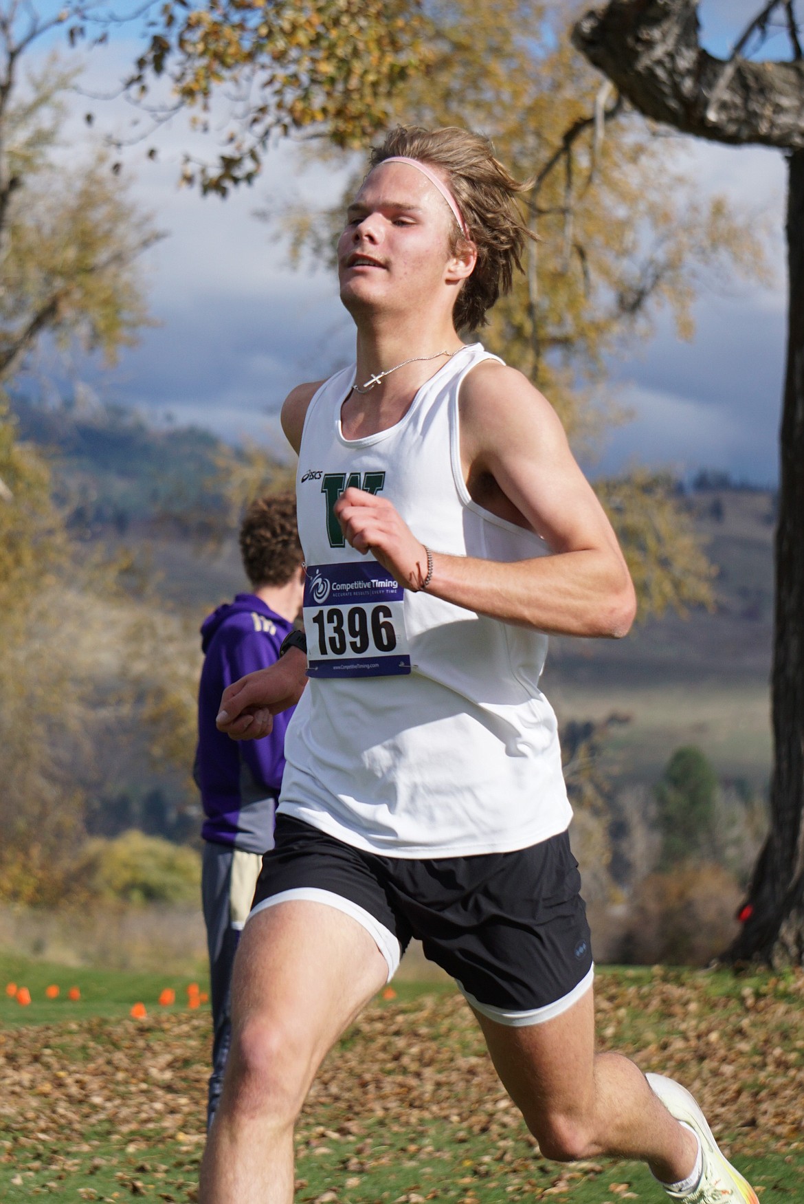 Whitefish senior Mason Genovese sprints toward a top-10 position at the Western A Fall Classic on Saturday in Frenchtown. (Matt Weller photo)